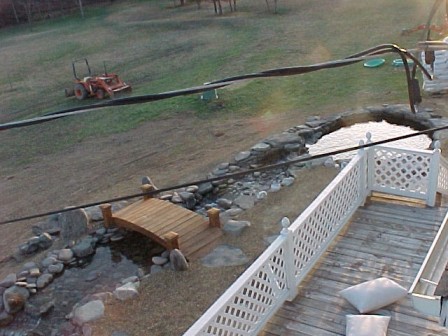 Upper pond, stream bed, bridge